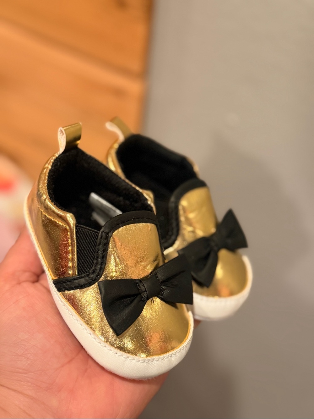 Gold Toddler Slip-On Shoes with Black Bow size 0-6 months